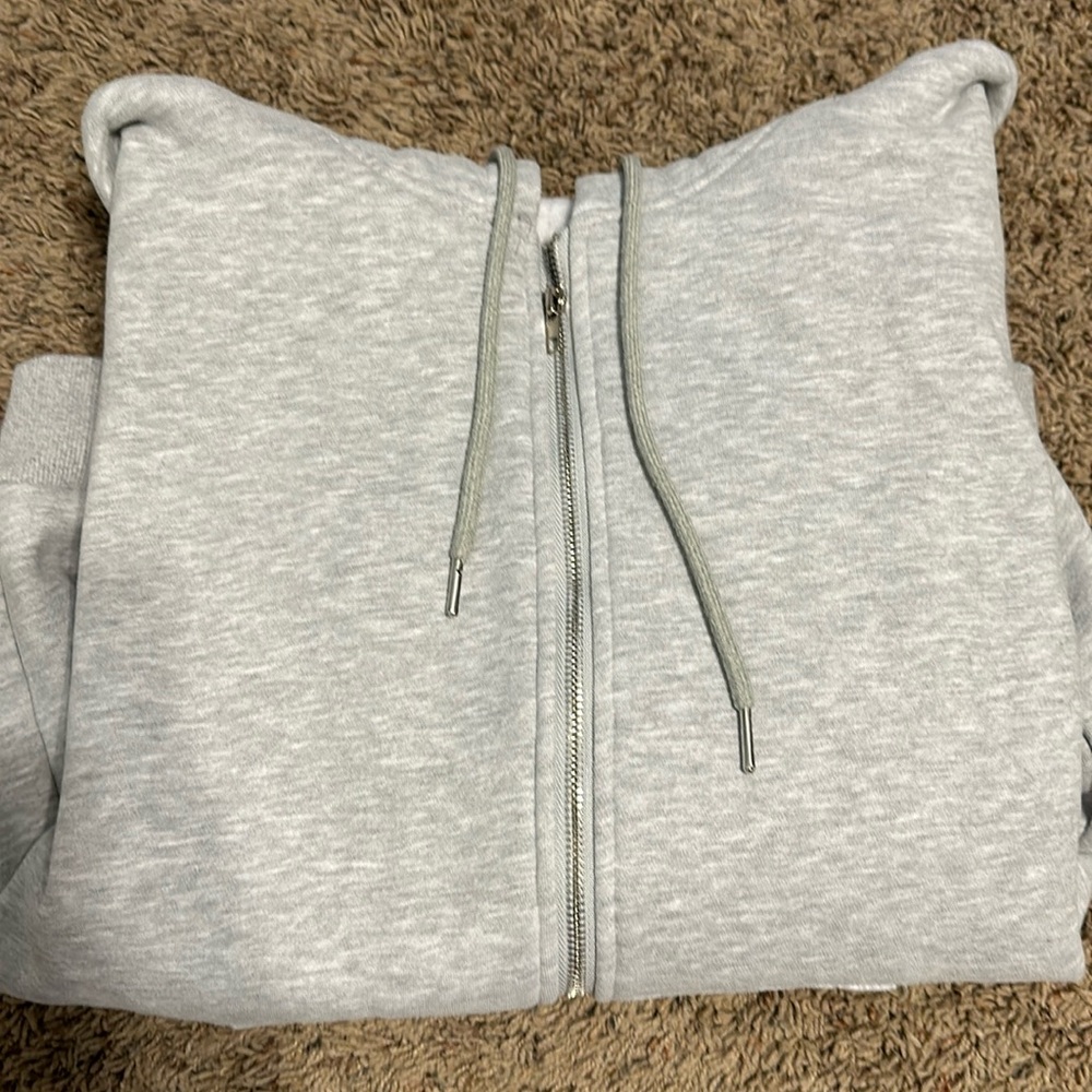 grey zip up. size medium